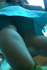 Voyeurs upskirt. Young prettie im mini skirt